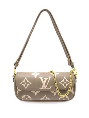 Louis Vuitton wallet on chain Lvy  + Brand  Box size 22x12 .. ofr
