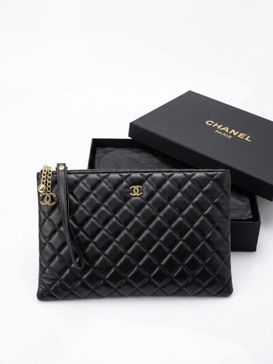 ⁦Chanel Black Quilted Leather clutch 
 + Brand Box , size 27*20⁩ - الصورة ⁦1⁩