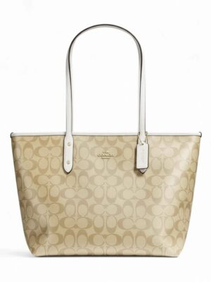 Coach tote in signature canvas with zipper  , size 44*30 .. ofr